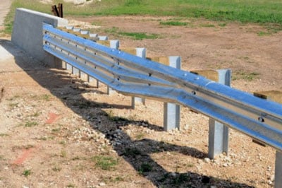 Transition from thrie beam to W beam guardrail fencing